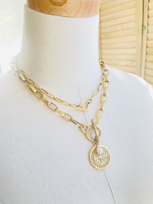 Nan Choker Handmade in the USA on mannequin display with gold pendant necklace