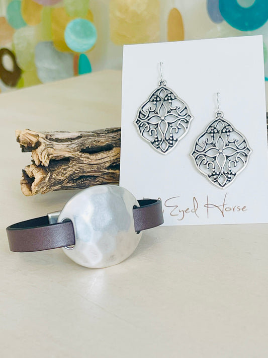 Jane Bracelet with earrings and driftwood in background