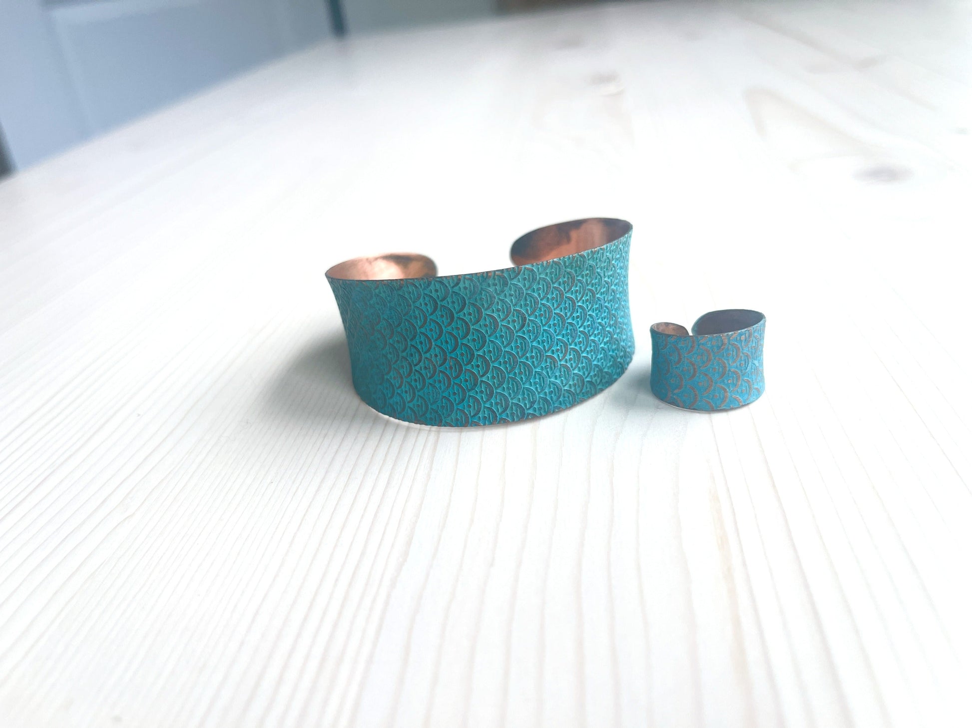 Handmade copper bracelet and ring designed with a textured rich turquoise patina