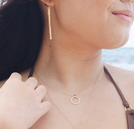 Woman wearing Gold Eternity Choker and Hammered Bar Earrings Handmade in the USA