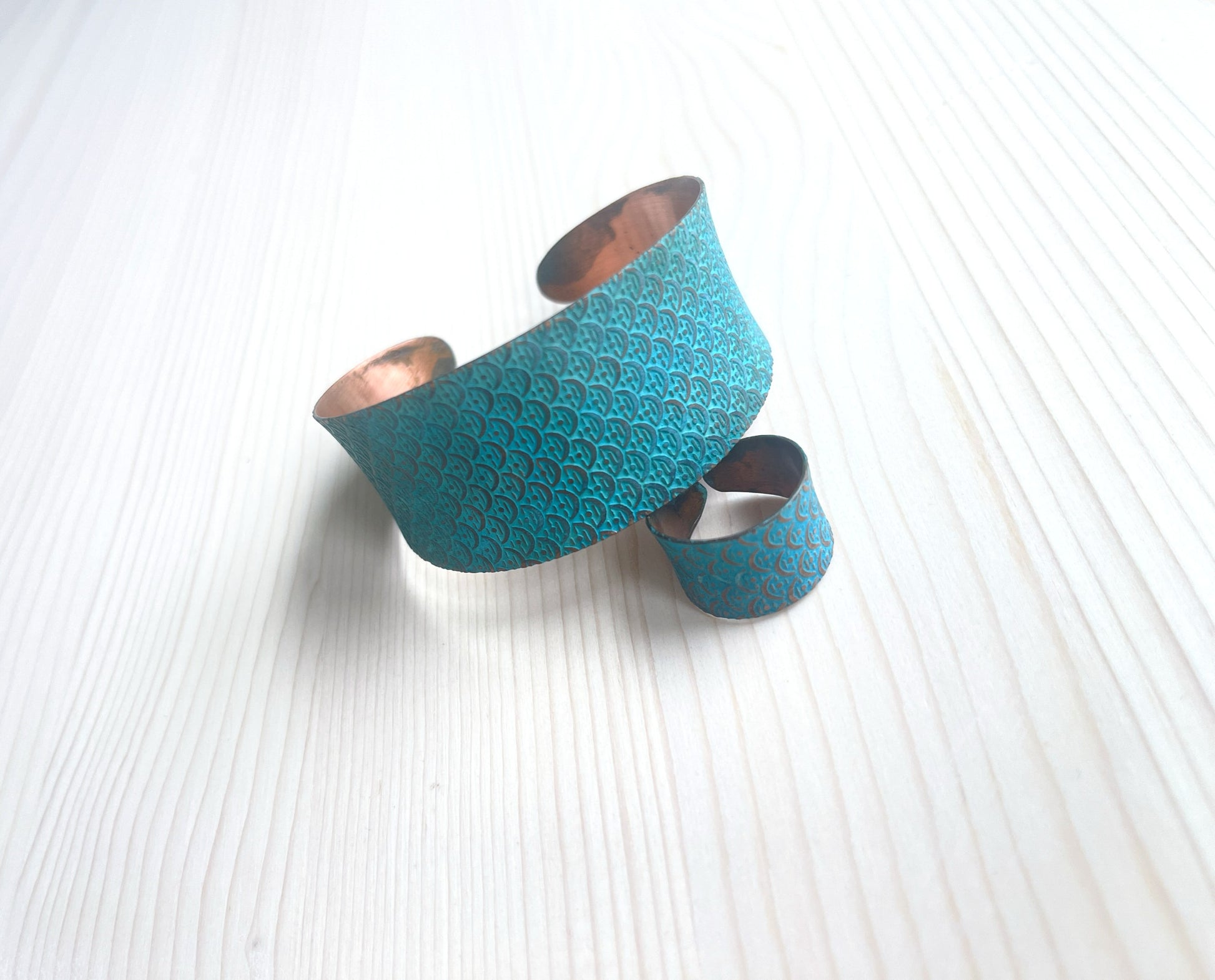 Handmade copper bracelet and ring designed with a textured rich turquoise patina