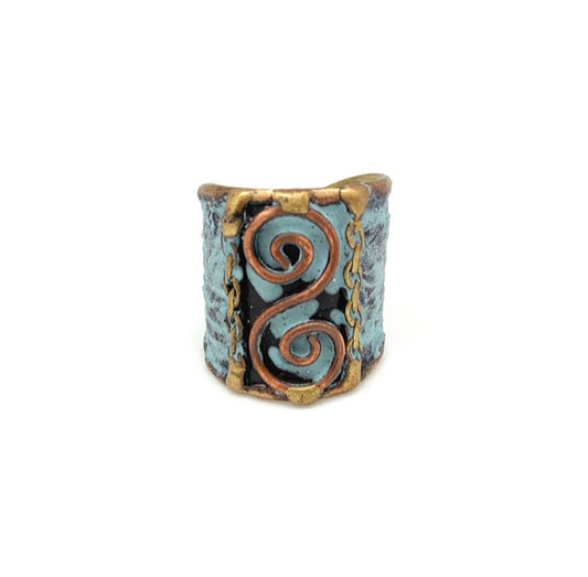 Handmade adjustable ring made of brass and copper with a vintage turquoise patina finish.
