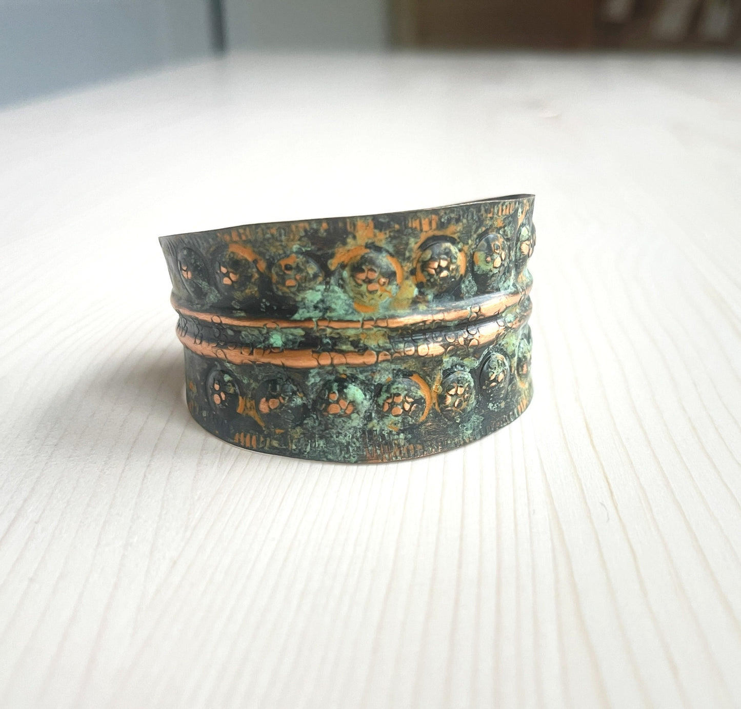 Handmade copper bracelet in a rich shades of green