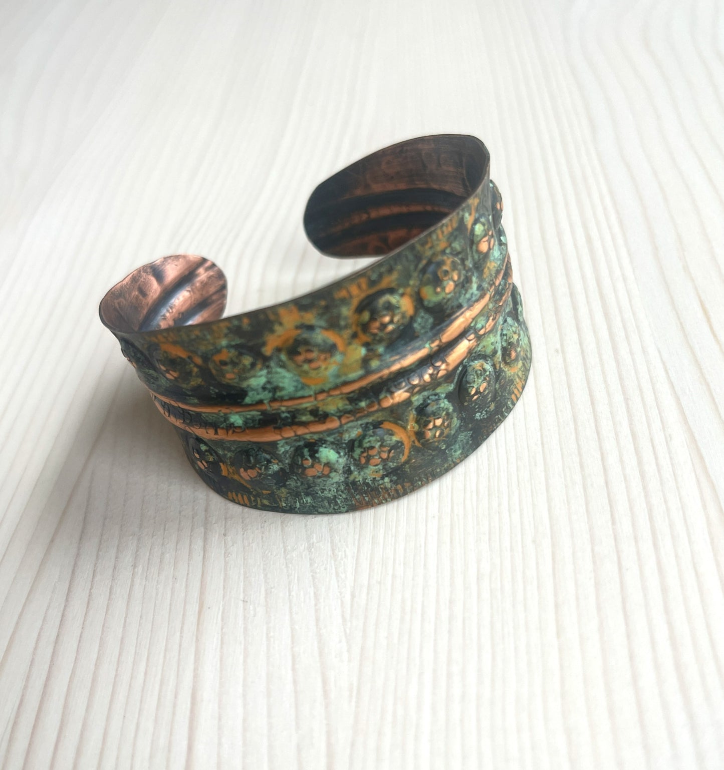 Handmade copper bracelet in a rich shades of green