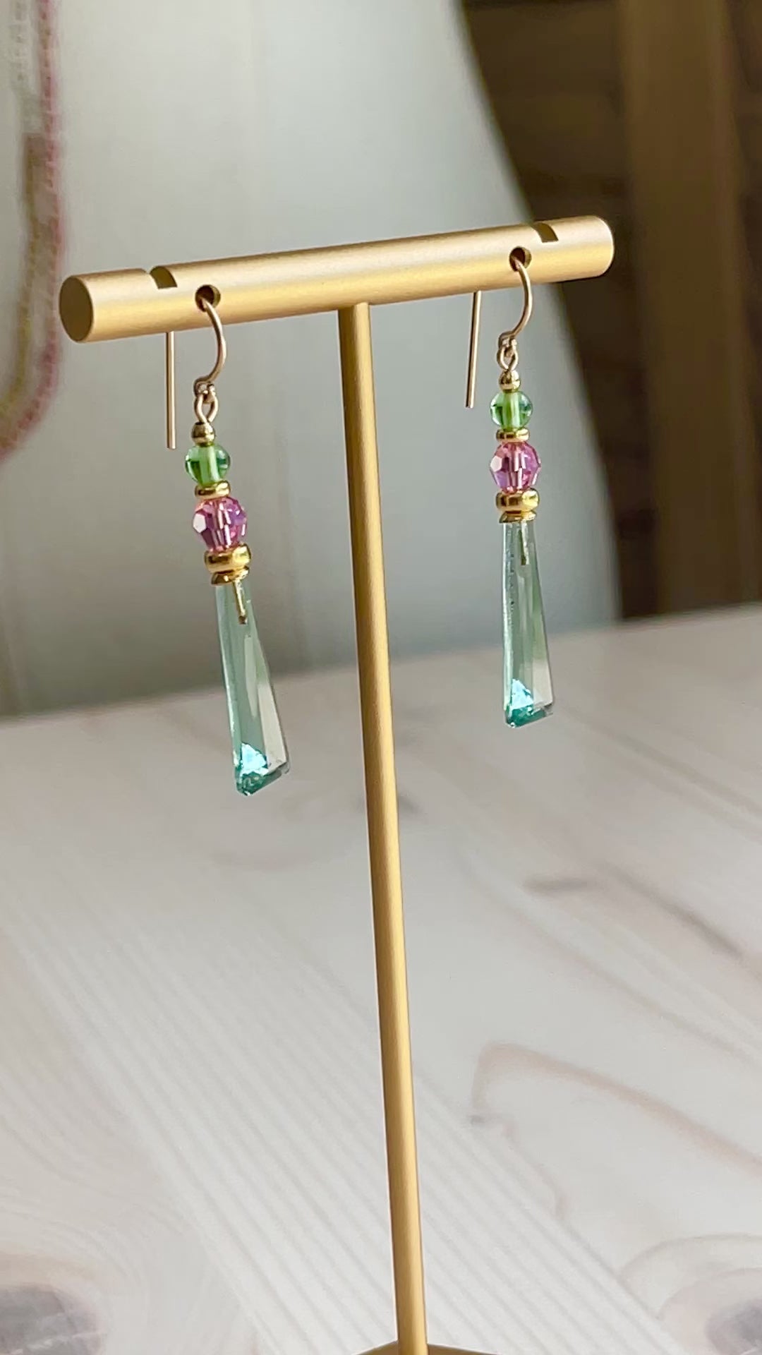 Video of Garland Drop Earrings Handcrafted in the USA on t-shaped display.  