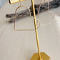Video of Gold Heart Earrings displayed on t-shaped stand