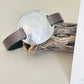 Jane Bracelet displayed on driftwood