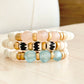 Blush, Ocean, and Zebra Batik Island Bracelets on table Handmade in the USA