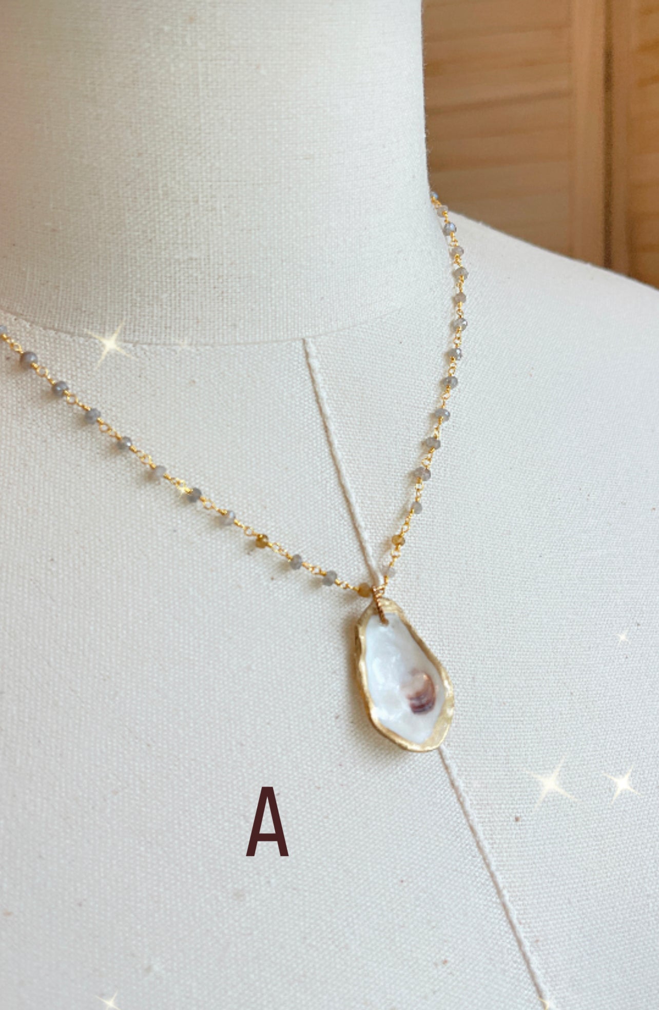  Oyster shell with mystic labradorite and amber gemstone beaded chain.  