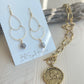 Lana Earrings Hand Crafted in the USA displayed with necklace on driftwood