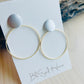 LuLu Earrings Made in the USA with driftwood in background
