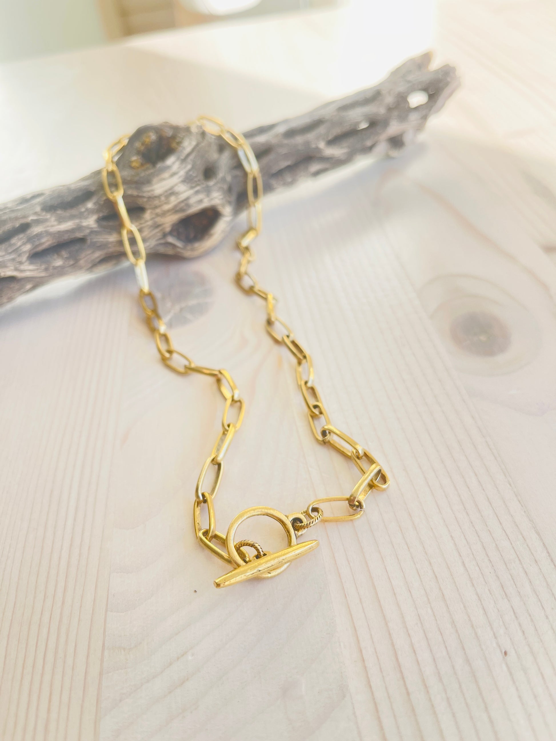 Nan Choker Handmade in the USA on driftwood