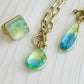 Ocean Quartz Necklace with matching ring that are Handmade in the USA on mannequin display.