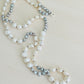 Ivory & Peacock Pearl Necklace displayed on mannequin