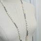 Ivory & Peacock Pearl Necklace displayed on mannequin
