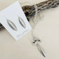 Taylor Necklace Handmade in USA displayed on top of driftwood with earrings