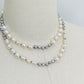 Ivory & Peacock Pearl Necklace displayed on mannequin