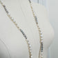 Ivory & Peacock Pearl Necklace displayed on mannequin