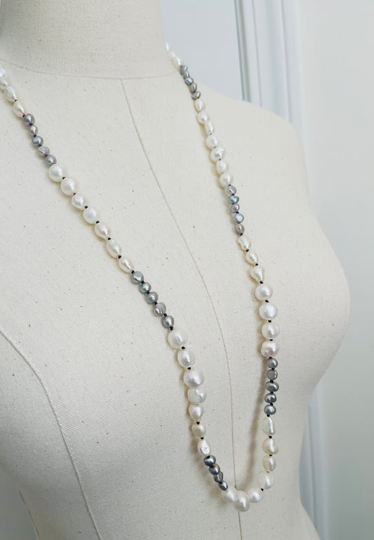 Ivory & Peacock Pearl Necklace displayed on mannequin